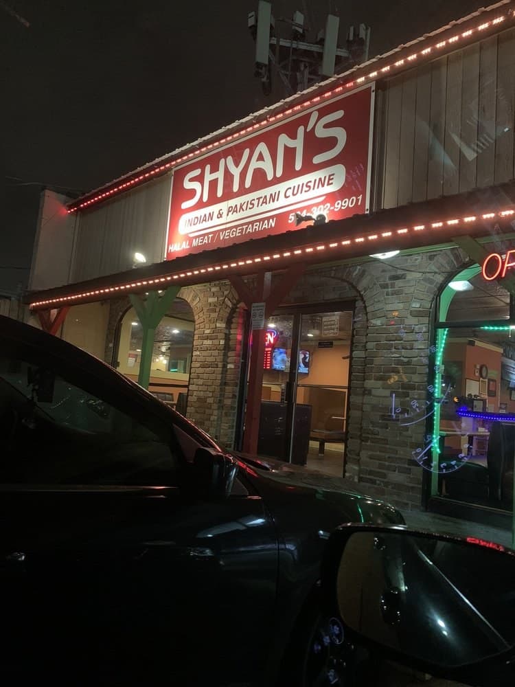 Shyan's Kitchen storefront at night
